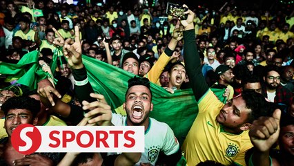 Brazil, Portugal fans celebrate as they advance to World Cup round of 16