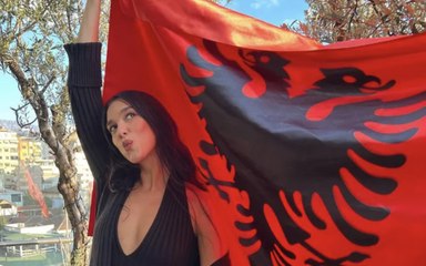 Dua Lipa Matched Her Super Cozy Fall Outfit to the Albanian Flag