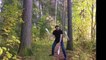 Artist Performs Juggling Tricks in Forest