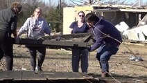 Mississippi residents start the long cleanup process after destructive tornadoes