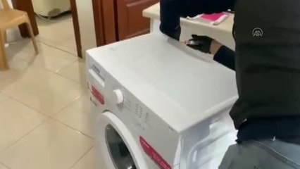 Çamaşır makinesine uyuşturucu ve silah gizleyen zanlı yakalandı