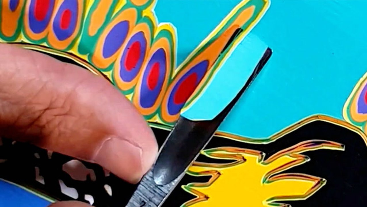 Unexpected colors revealed by carving thick layers of paint