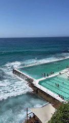 Wave Hits Swimming Pool