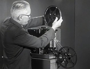 Threading the 16mm Projector 1950.