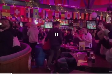 Fans celebrate as England beat Senegal in the World Cup to reach quarter finals