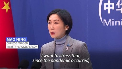 China defends its Covid policy as it eases strict virus measures