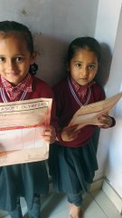 Akshu & Duggu participated in olympiad for coloring in school
