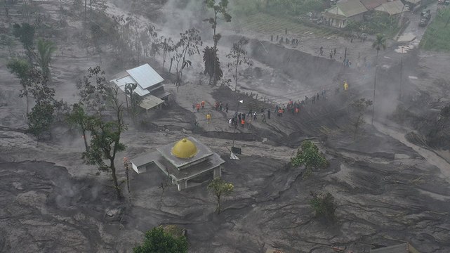 Houses buried under blanket of ash after Indonesia's Mount Semeru erupts