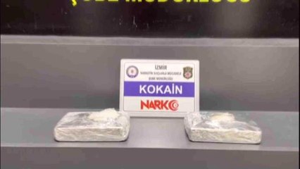 İzmir'e yolcu otobüsü ile 2 kilogram kokain getiren zehir taciri kadın yakayı ele verdi