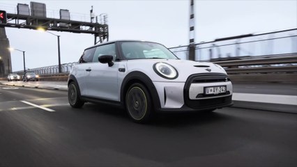 MINI Cooper S Electric Resolute in White Driving in the city
