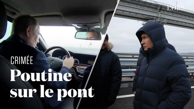 Poutine conduit une voiture sur le pont de Crimée, qui avait été endommagé par une explosion