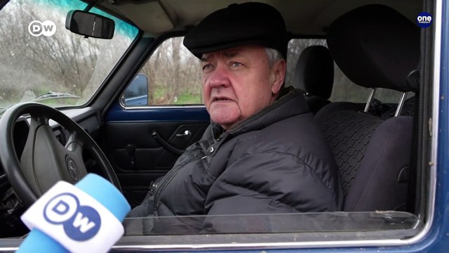 Ukrainian civilians try to flee Russian-occupied territory