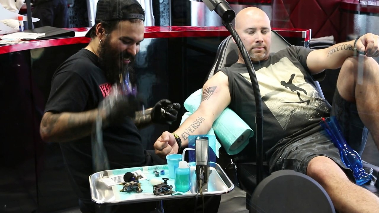 A man getting a tattoo.