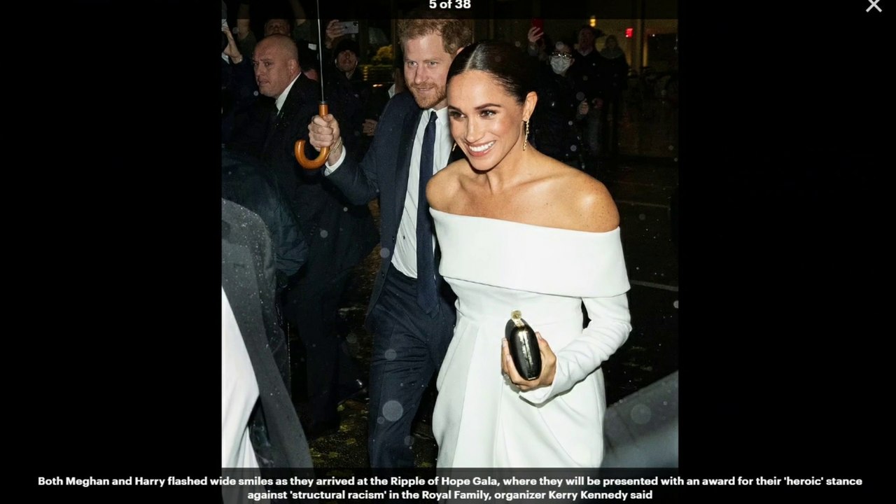 Meghan Markle dons white off-the-shoulder dress with daring thigh-high slit to accept 'anti-racism' award in New York with Prince Harry - days after Princess of Wales wore near-identical design