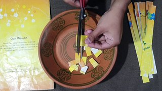 Cutting Cardboard With Scissors