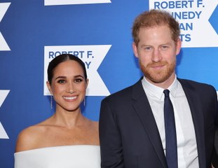 Meghan and Prince Harry Smile Away The Controversy On The Red Carpet
