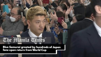 Blue Samurai greeted by hundreds of Japan fans upon return from World Cup