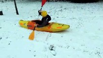Thrill-seeker rides canoe down hill in the snow