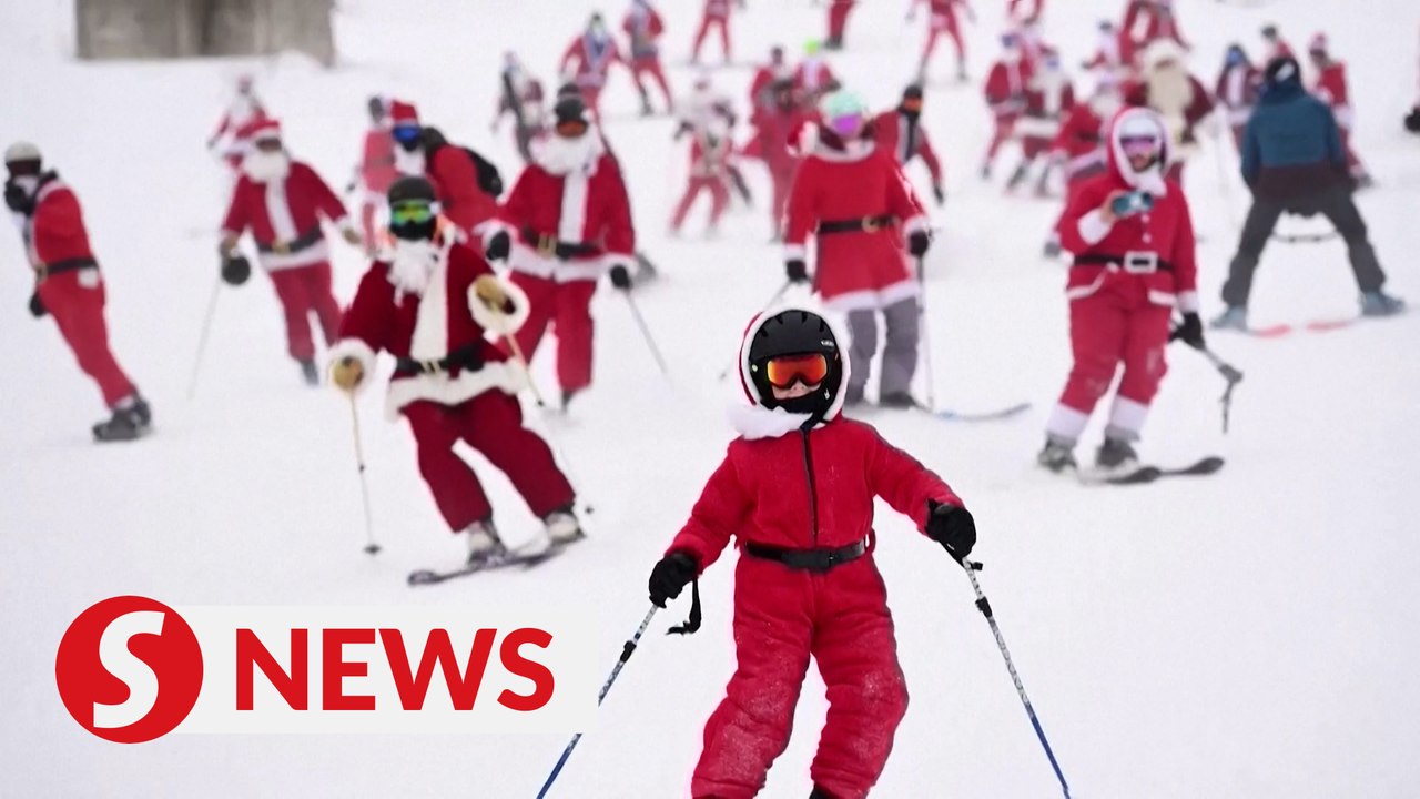 ‘Santa Claus’ take part in skiing and running events in US and Mexico
