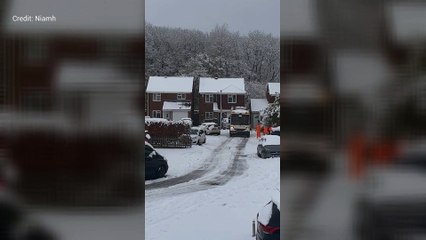 Bin men have snowball fight