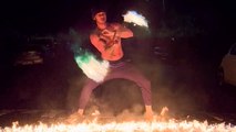 Bold Fire-Knife dancer LEVELS UP with a BLAZING freestyle fire trick