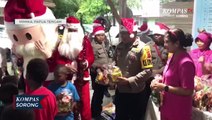 Berbagi Kebahagiaan Polres Mimika Rayakan Natal Bersama Anak-Anak