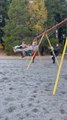 Kid Gets Stuck on Swing While Trying to Jump Off it With His Siblings