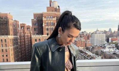 Dua Lipa Wore the Most Confusing Combination of a Cut out Dress and Pants