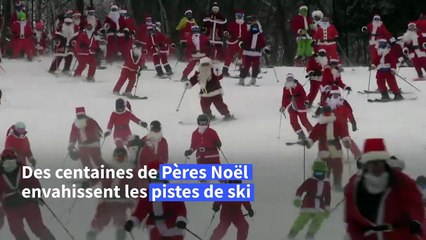 USA: des centaines de Pères Noël dévalent les pistes pour une collecte de fonds