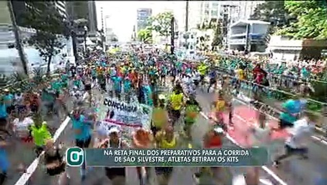 Na reta final dos preparativos para a corrida de São Silvestre, Atletas retiram os kits