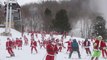 Hundreds of Santas Ski for a Very Good Reason
