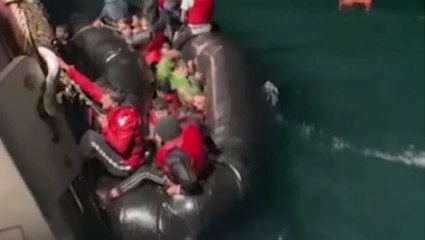 Video shows capsized boat carrying almost 50 people through the English Channel