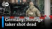 Police stormed shopping center where the man held two hostages - DW News