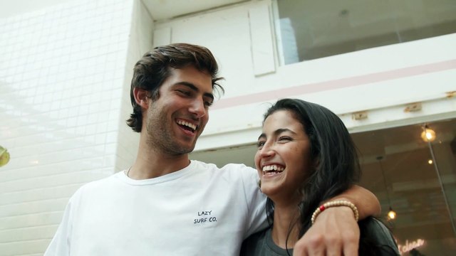 Friends laughing and looking at the camera