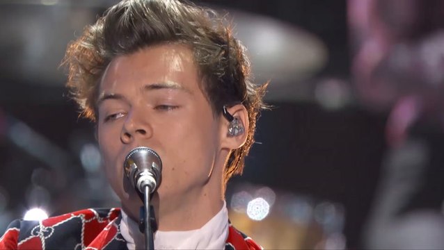 Harry Styles Hilariously Rips Glittering Jumpsuit While High Kicking Onstage As Fans Scream