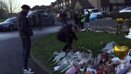Aston Villa’s McGinn and Mings lay wreath for Solihull boys