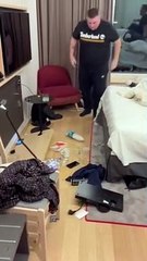 Guys Break Shelf in Hotel Room