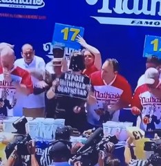 Joey Chestnut Chokes out a Protestor