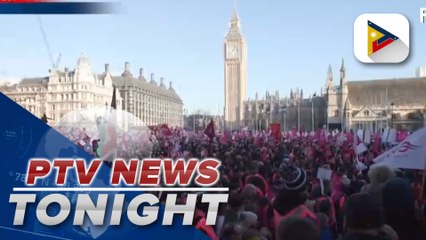 Thousands of UK postal workers rally over pay, working conditions