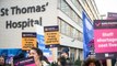 ‘Claps don’t pay the rent’: NHS nurses strike outside St Thomas’ hospital