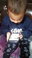 Trishu self played specific song on mobile as indicated by her Father