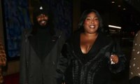 Lizzo’s Chaotic LBD Included a Plunging Neckline and Sky-High Lace-Up Slits