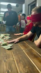 Family Plays Mouse Trap Cash Grab Game