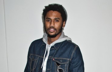 Trey Songz turns himself into authorities after allegedly punching two people in bowling alley