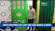 Bripka Muhammad Nur, Bhabinkamtibmas Polsek Labuhan Ajari Anak-Anak Mengaji Al-Quran