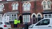 Detectives searching for a child's remains at a house in Birmingham after arresting a man and a woman
