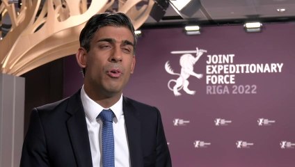 PM hits out at football pundit Neville after TV criticism