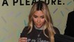 Kim Kardashian Paired an Ultra-Cropped Y2K Concert Tee with Bejeweled Leather Pants