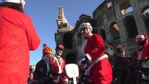 Cycling Santas peddle through Rome to raise money for charity