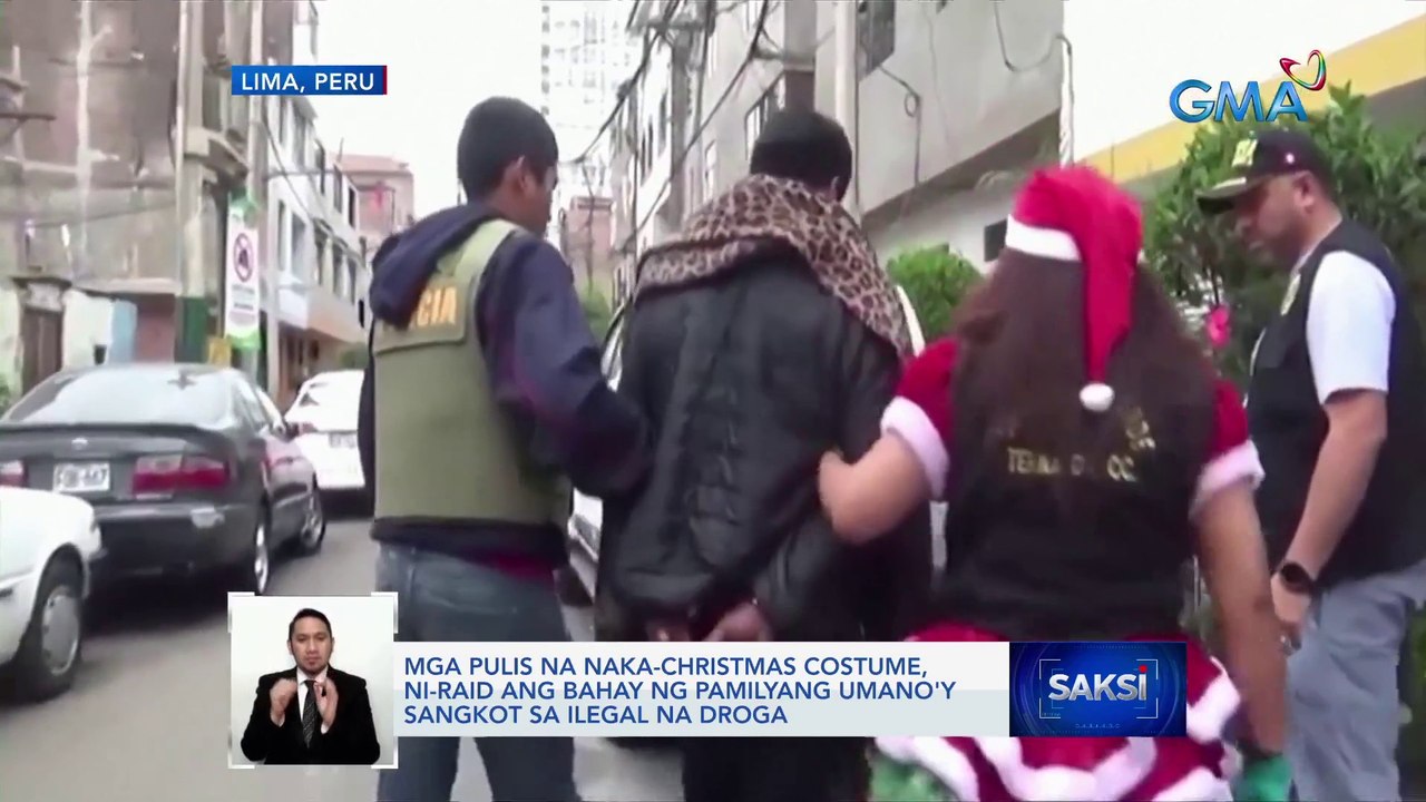 Mga pulis na naka-Christmas costume, ni-raid ang bahay ng pamilyang umano'y sangkot sa ilegal na droga | Saksi